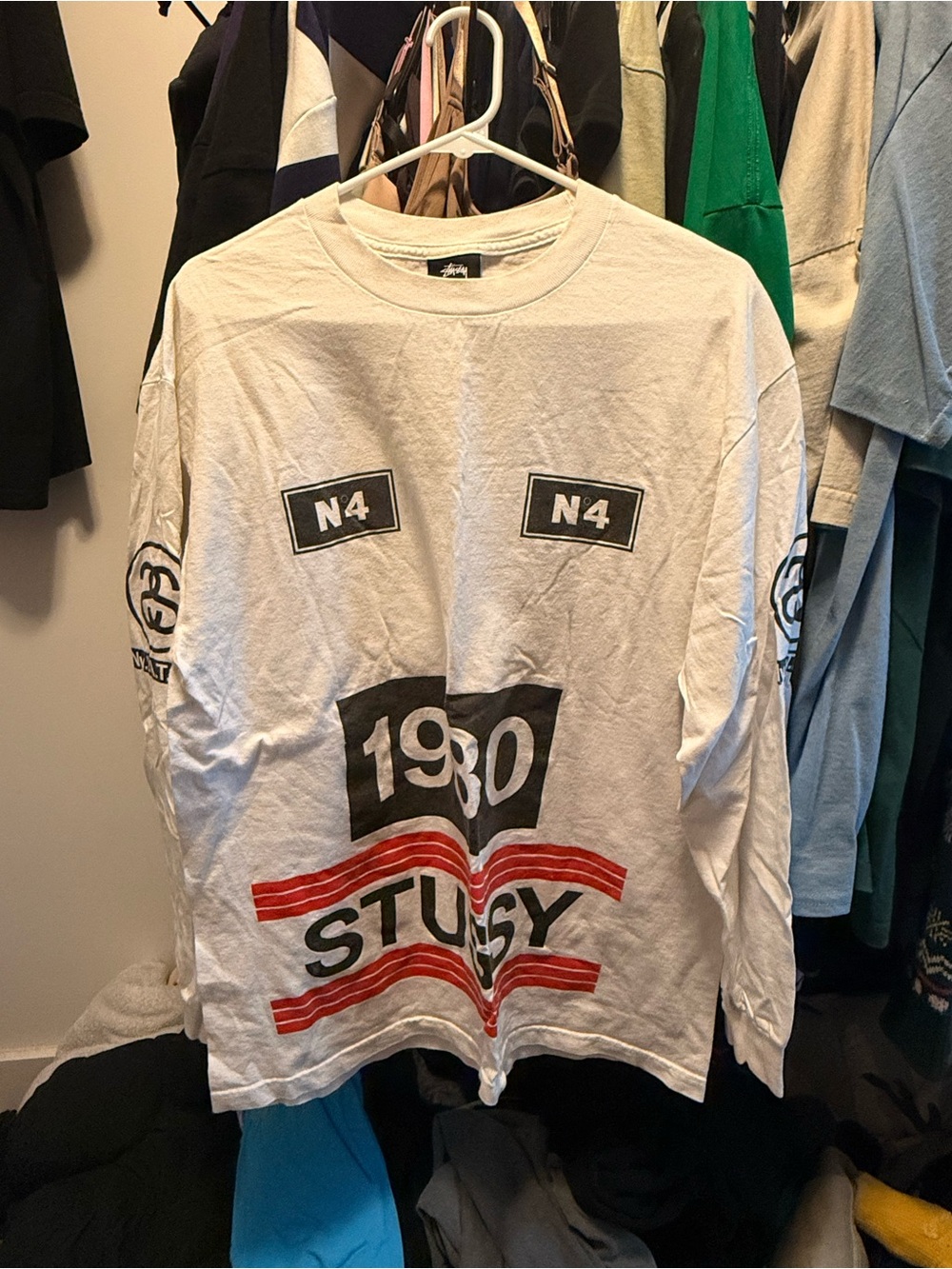 Stussy White Long Sleeve Tee with Black & Red Graphics